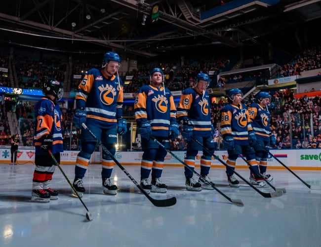 The Saskatoon Blades lined up at centre ice